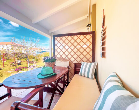 Enjoy a serene garden view from the comfort of your private terrace.
