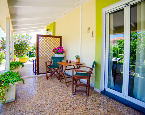 Private terrace/patio with garden view.